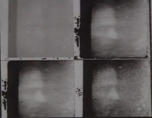 Four black and white headshots of a man, the photos get progressives more clear. 