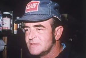 Permon Gilbert, wearing a denim baseball cap