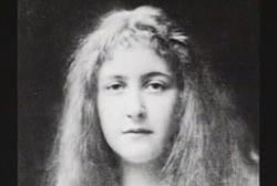 A black and white headshot of Agatha Christie
