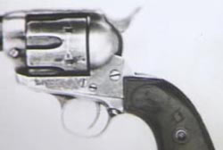 A pistol with Cassidy's brand.