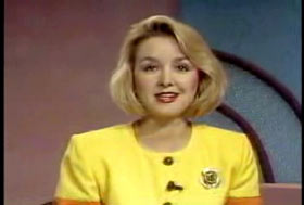 A caucasian female news anchor wearing a yellow dress and has shoulder length blonde hair, Jodi Huisentruit.