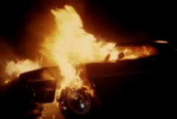 A car engulfed in flames.