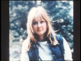A middle aged woman, Patricia Meehan, with shoulder length brown hair and bangs.