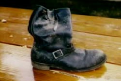 Tom's worn leather boot