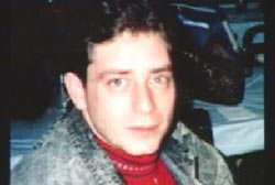 A young caucasian man, David Hurley, with short brown hair.