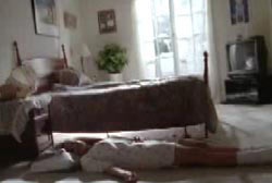 Jamie's lifeless body on the floor of her bedroom