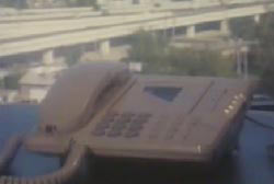 A landline phone on a desk