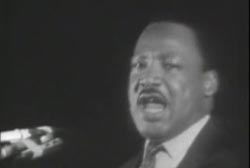 Martin Luther King Jr. giving a speach