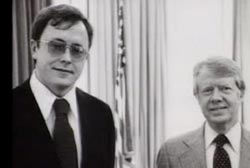 Michael Franke in suit and tie standing next to Jimmy Carter