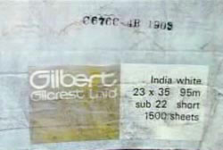 A box with information written on the side that reads 'India White, 23 x 35 95m sub22 short 1500 sheets'