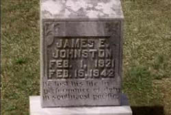 Headstone that reads 'James E. Johnston Feb 1, 1921 - Feb 15 1942