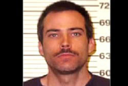 Mug shot of Eric Rudolph with mustache