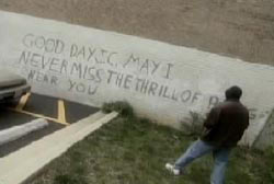 Message written on wall that reads 'Good day, J.C. may I never miss the thrill of being near you.'
