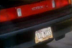License plat of a car that reads 'LIL MISS'