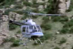 A helicopter flying through the canyon