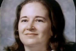Smiling Aileen Conway with brown hair