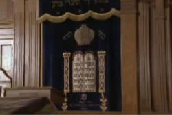 A banner with hebrew inscriptions in the main hall of a Yeshiva