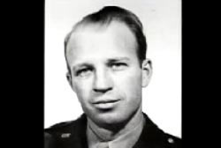 Smiling Frank Olson in a military uniform