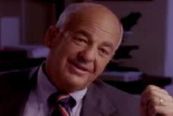 Dr. Cyril Wecht in a suit and tie