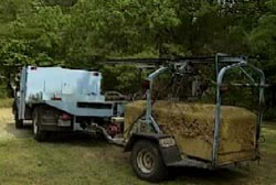 The exhumed caskett of Keith Warren being taken to a lab on a trailer to be tested