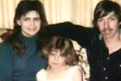 Linda Sherman with her husband and young daughter