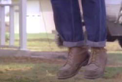 Billys swaying legs and boots as he hangs
