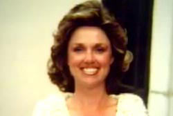 Smiling Patsy Wright with curly light brown hair