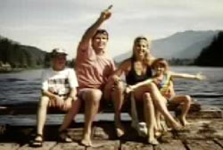 Philip on a lake outing with his wife and two young children