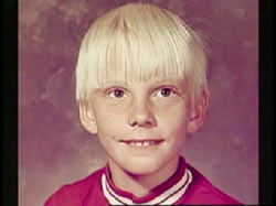 Smiling Scott Johnson with light blonde hair
