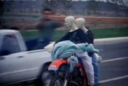 A recreation of the crime with dummies on the motorcycle