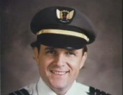 Smiling Jack Lutter with in flight captain uniform