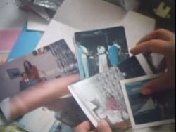 Fatima looking through photographs of Jack with his other wives
