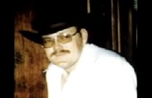 Dub wearing a cowboy hat, glasses and a mustache