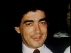 Smiling Salvatore Caruana in a suite and tie