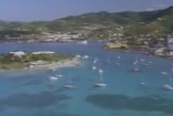 Port of the island of St. Croix with sailboats on the water and buildings along the coast