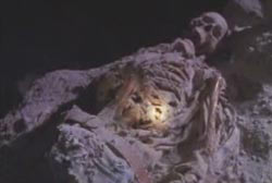 Skeletal remains of Gary Simmons in a dark cave